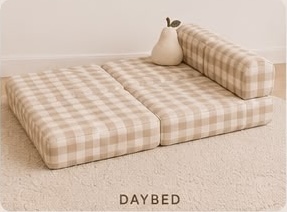 Kiko Cub Couch modular sofa in neutral linen fabric set up as a children's daybed